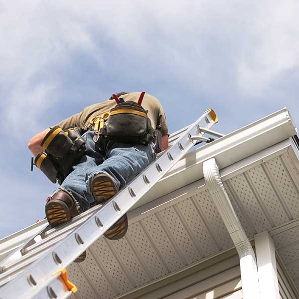 Man installing a gutter