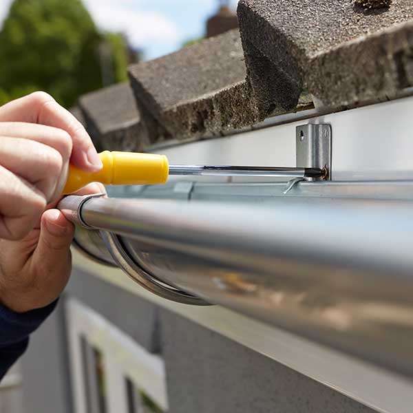 Man repairing a gutter